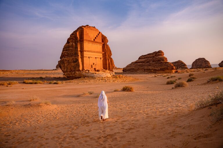 Model,Woman,Standing,At,Hegra,Preserved,Tombs,Set,In,Stunning